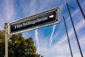 Schild 110 – Flüchtlingsheim